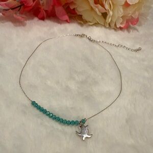 Elegant Silver and Blue Necklace with Tuttle Pendant